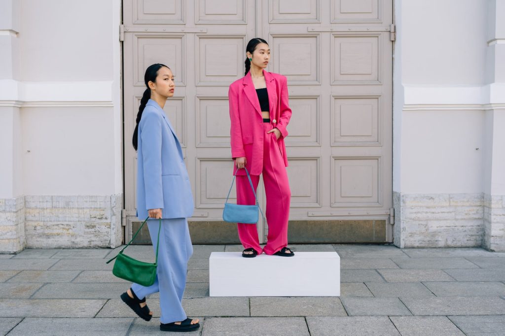 stylish women holding bags