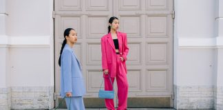 stylish women holding bags