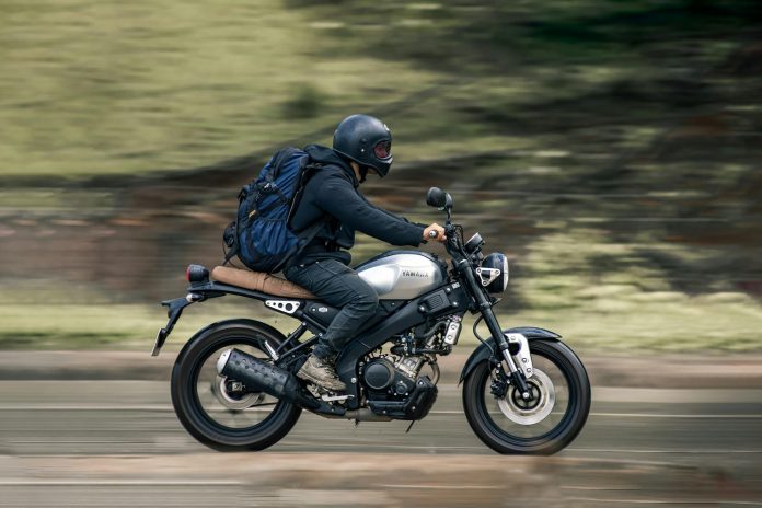 pexels-photo-12440389 a man riding a motorcycle