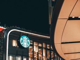 bustling nightlife at modern starbucks cafe
